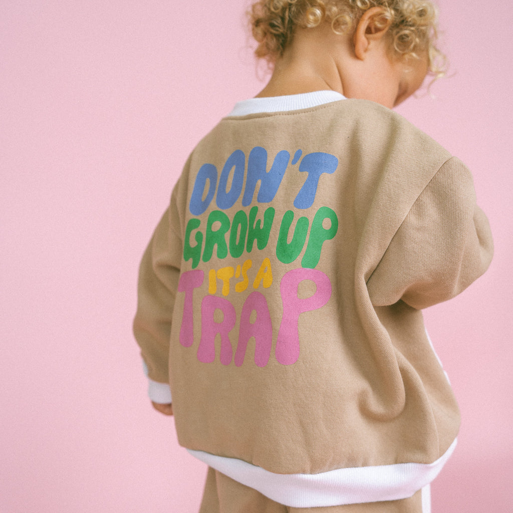 DON’T GROW UP jumper 〰️ beige