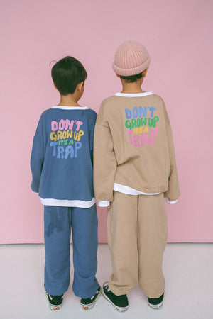 DON’T GROW UP jumper 〰️ beige