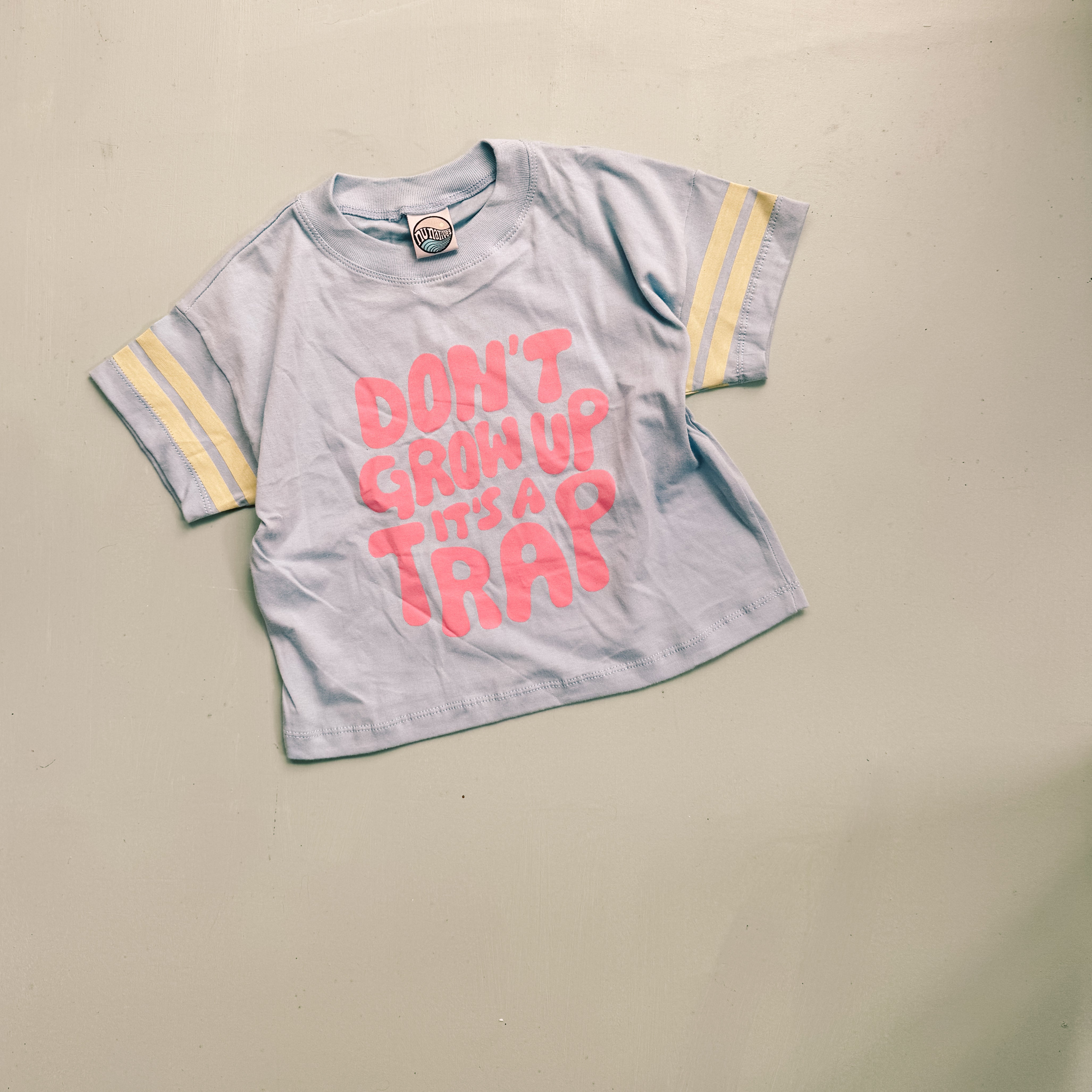 DON’T GROW UP tee ~ sky